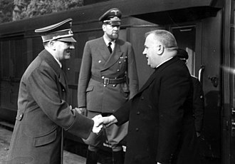 Father Tiso shakes Hitler's hand
